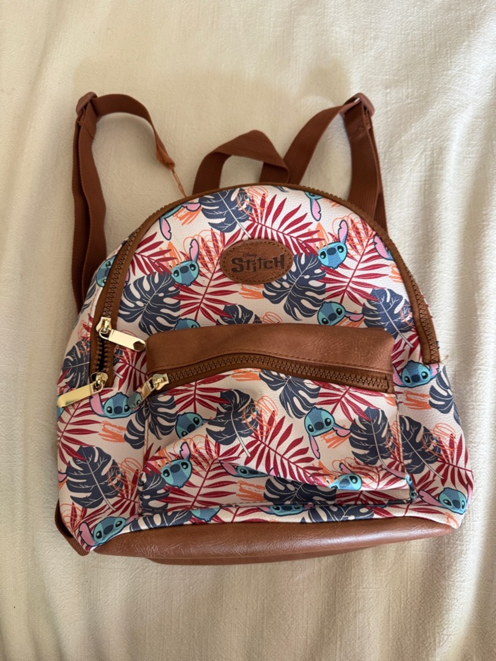 Bioworld Tropical Lilo and Stitch Mini Backpack in Pink, blue, and Brown Disney